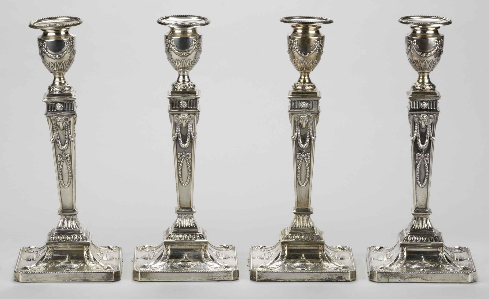 ENGLISH "ADAMS STYLE" STERLING SILVER WEIGHTED CANDLESTICKS, SET OF FOUR, each with  (1 of 2)
