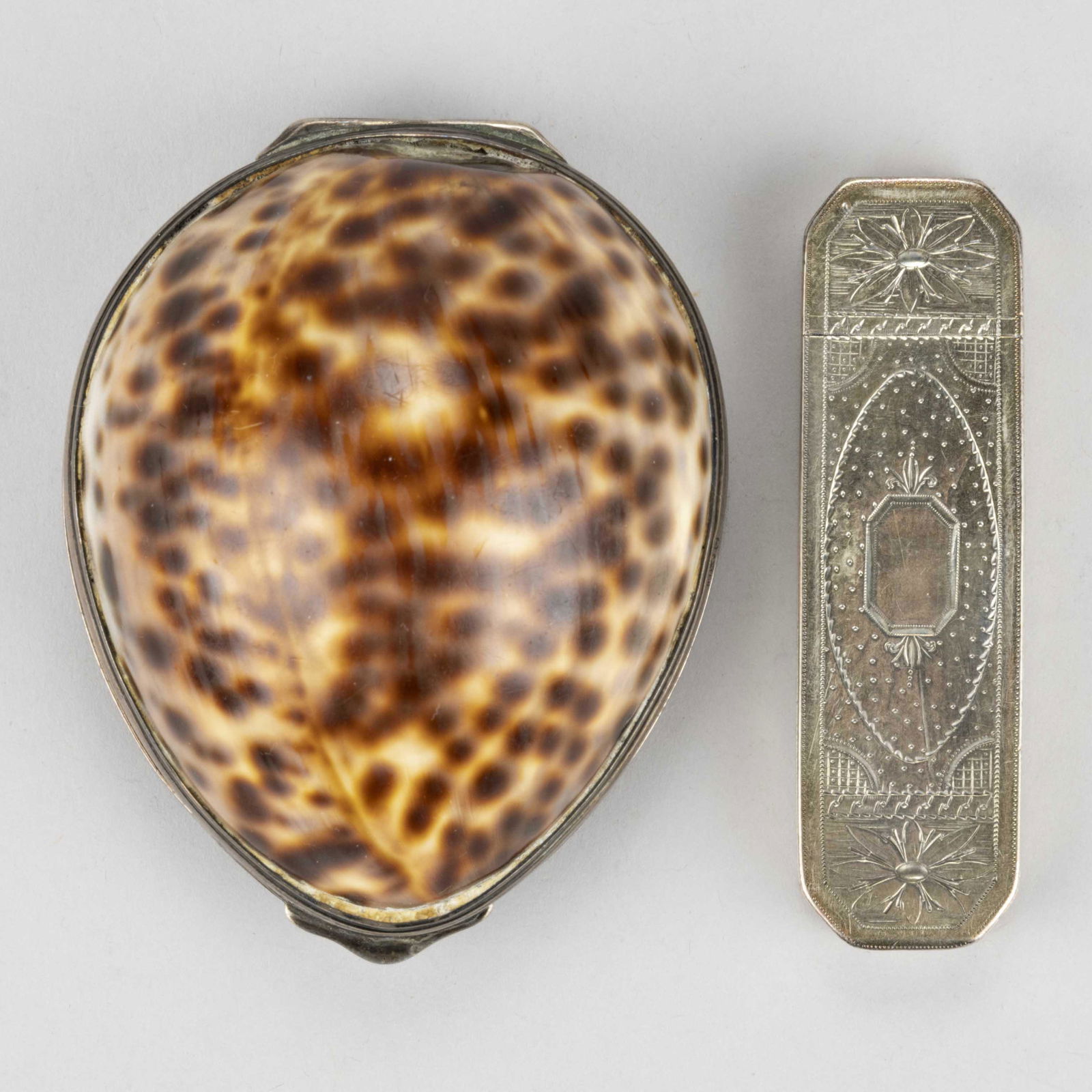 GEORGIAN ENGLISH STERLING SILVER SNUFF / OTHER BOXES, LOT OF TWO, comprising a cowrie shell snuff (1 of 2)