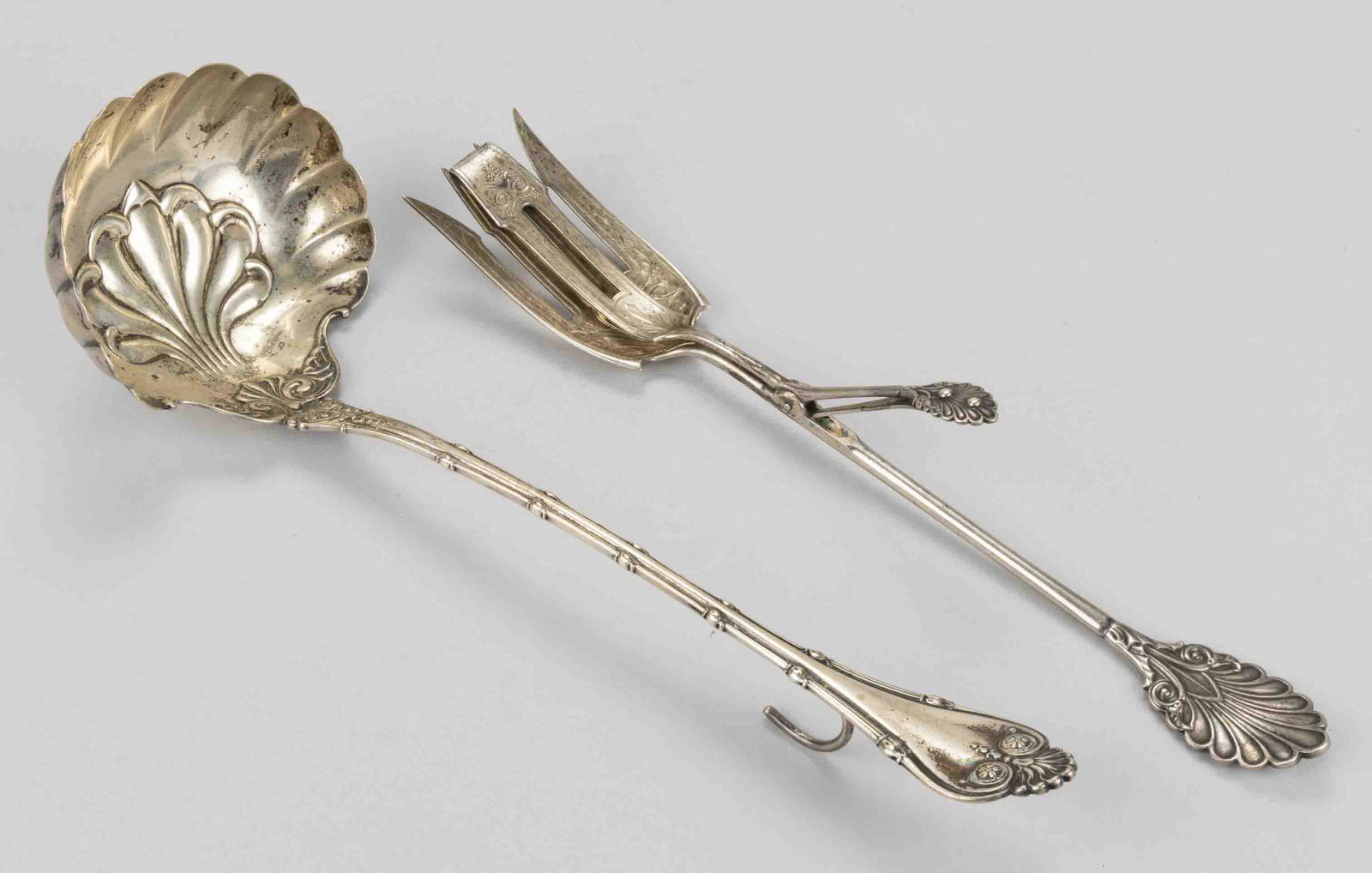 GORHAM COIN SILVER AND WHITING STERLING SILVER SERVING UTENSILS, LOT OF TWO, comprising a coin (1 of 1)