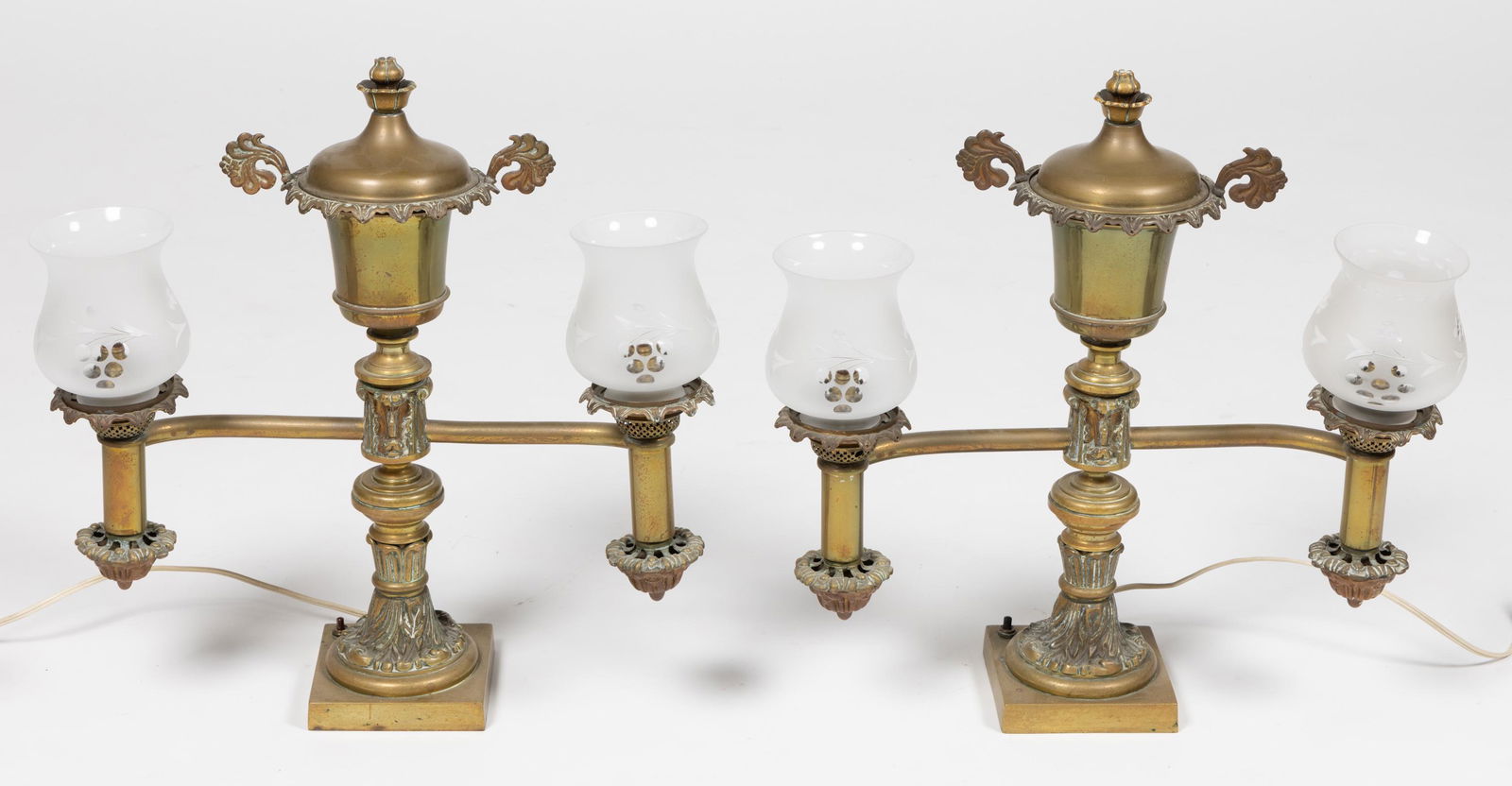 CAST-BRASS PAIR OF ARGAND MANTLE LAMPS, later frosted and engraved glass shades, double-armed (1 of 7)