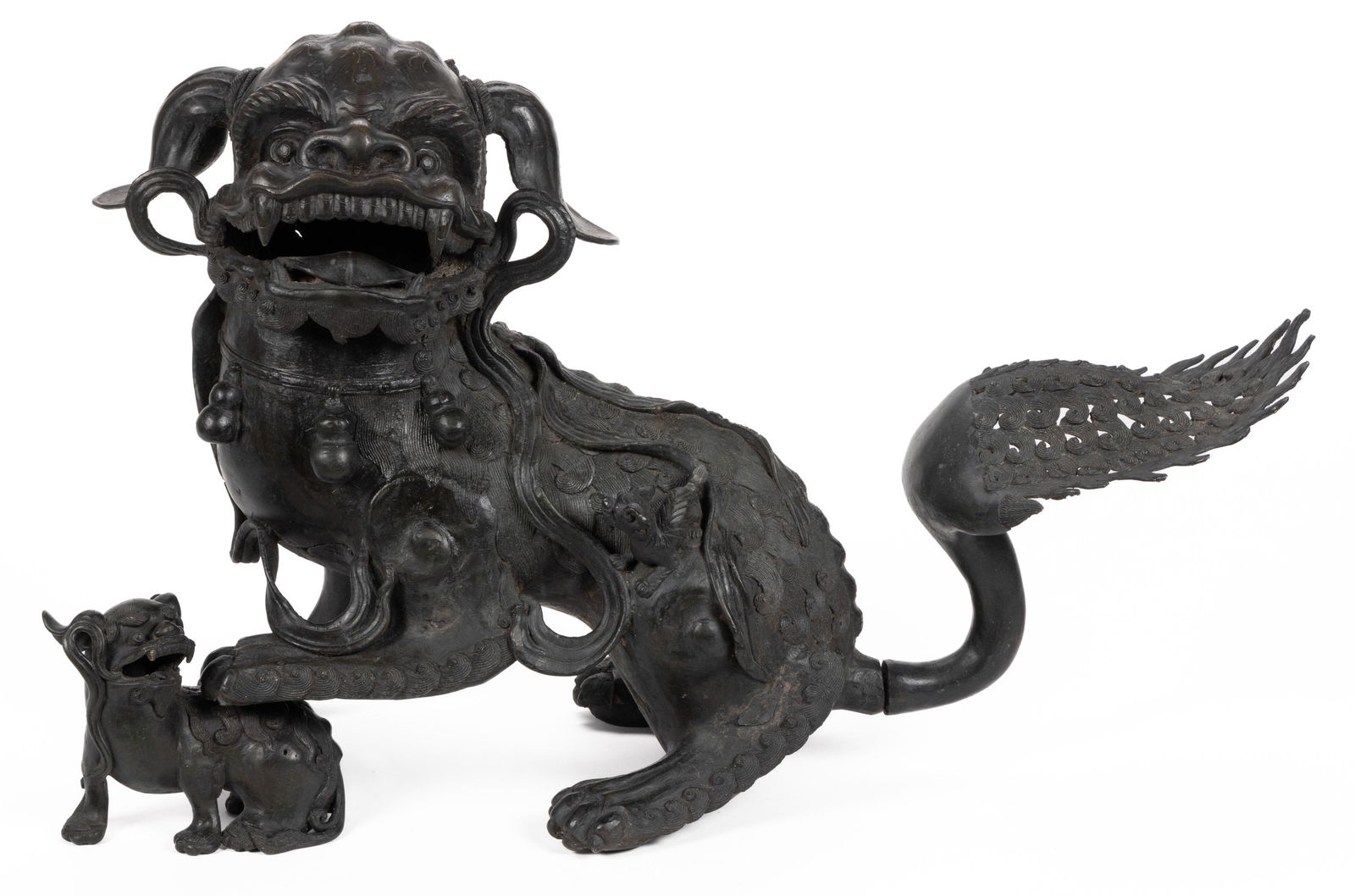 LARGE CHINESE BRONZE FOO DOG CENSOR, female form with detachable tail and foot resting on a (1 of 9)
