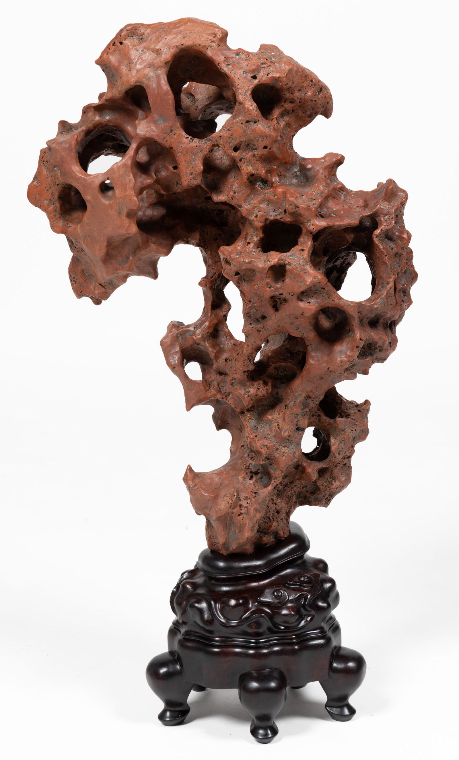 CHINESE SCHOLAR'S STONE WITH STAND, cloud form, having maroon color, and fitted on a (1 of 5)