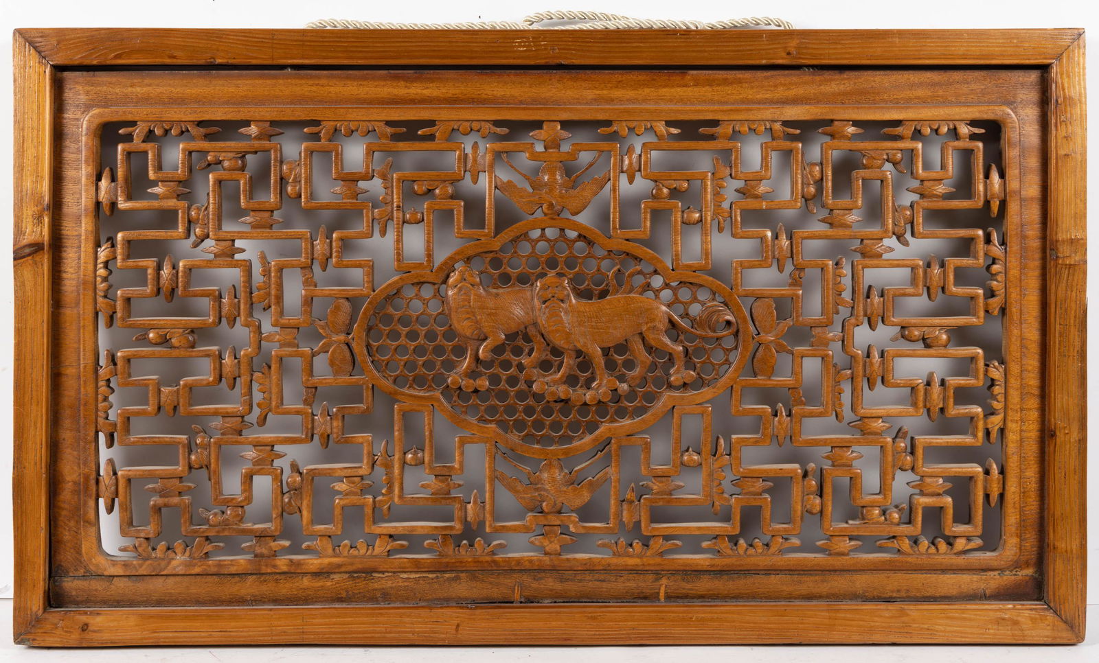ASIAN CARVED HARDWOOD WALL PLAQUE, possibly depicting two foo dogs. Retains an old surface with (1 of 2)