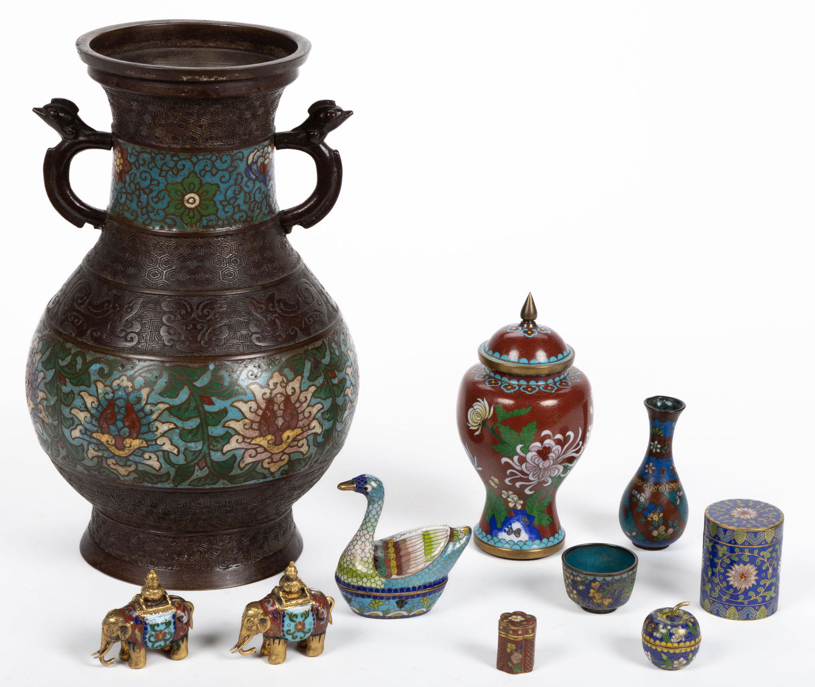CHINESE / JAPANESE CLOISONNE ARTICLES, LOT OF TEN, comprising a bronze-patinated vase with two (1 of 6)