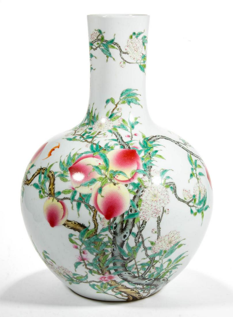 CHINESE EXPORT PORCELAIN FAMILLE ROSE LARGE VASE, bulbous body with tapered neck, featuring: CHINESE EXPORT PORCELAIN FAMILLE ROSE LARGE VASE, bulbous body with tapered neck, featuring bold polychrome peach tree motif with flowering, twisted branches and some fluttering bats. Having blue