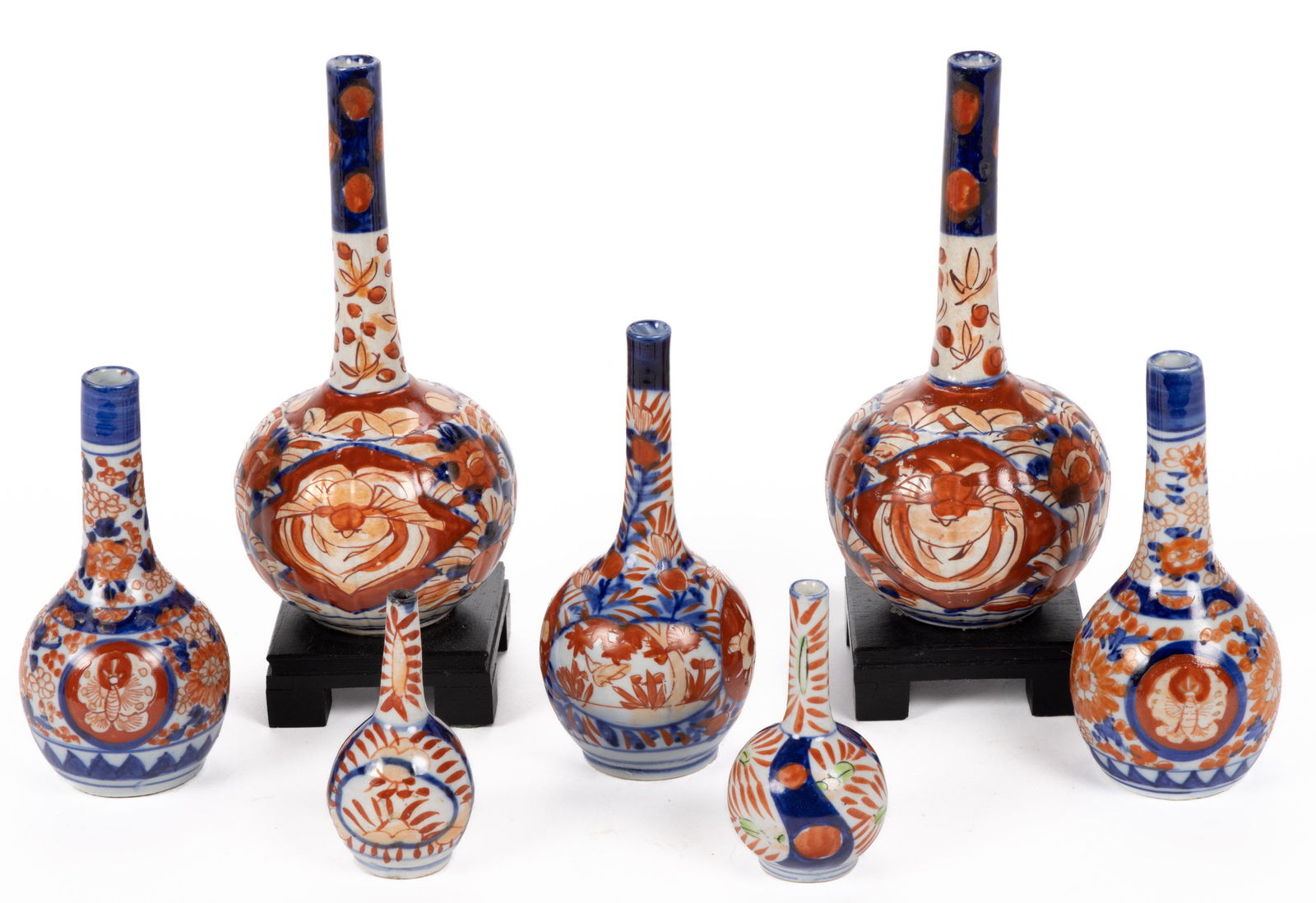 JAPANESE MEIJI / TAISHO-PERIOD IMARI PORCELAIN VASES, LOT OF SEVEN, each of bottle form,  (1 of 5)