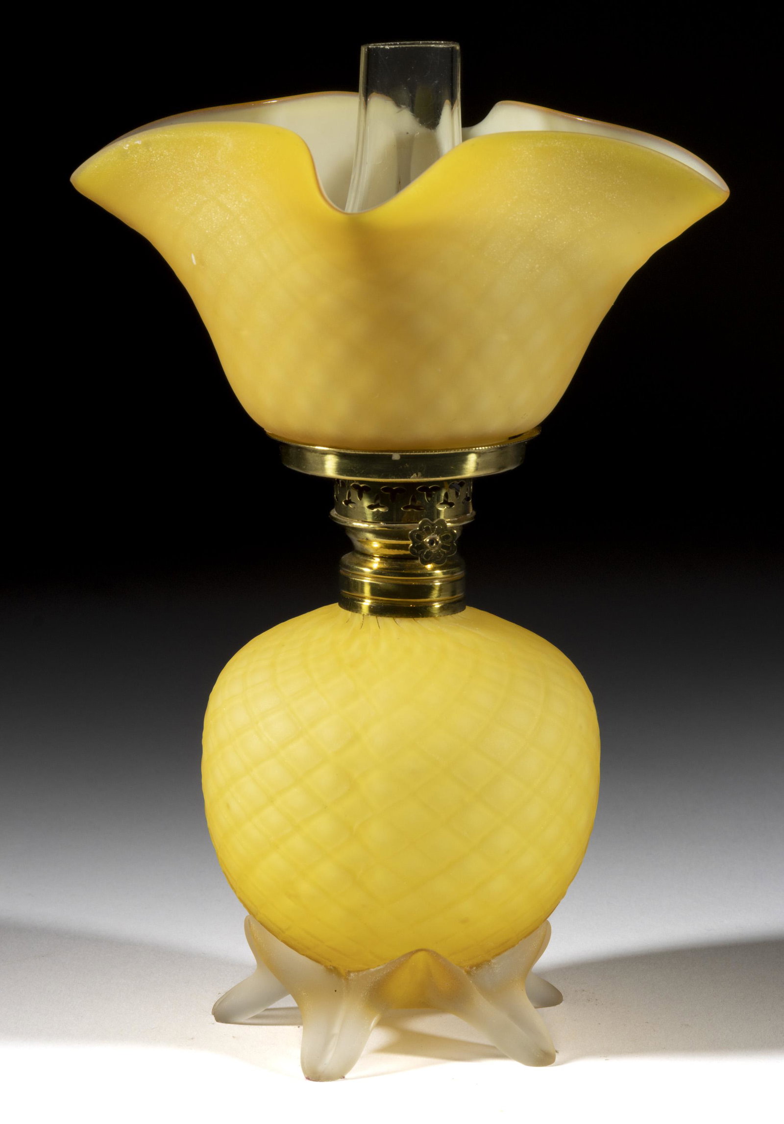 CUT VELVET DIAMOND QUILTED ART GLASS MINIATURE LAMP: CUT VELVET DIAMOND QUILTED ART GLASS MINIATURE LAMP, cased butterscotch yellow with satin finish, elongated ball-form font, colorless applied base raised on five toes, slightly darker and matchin