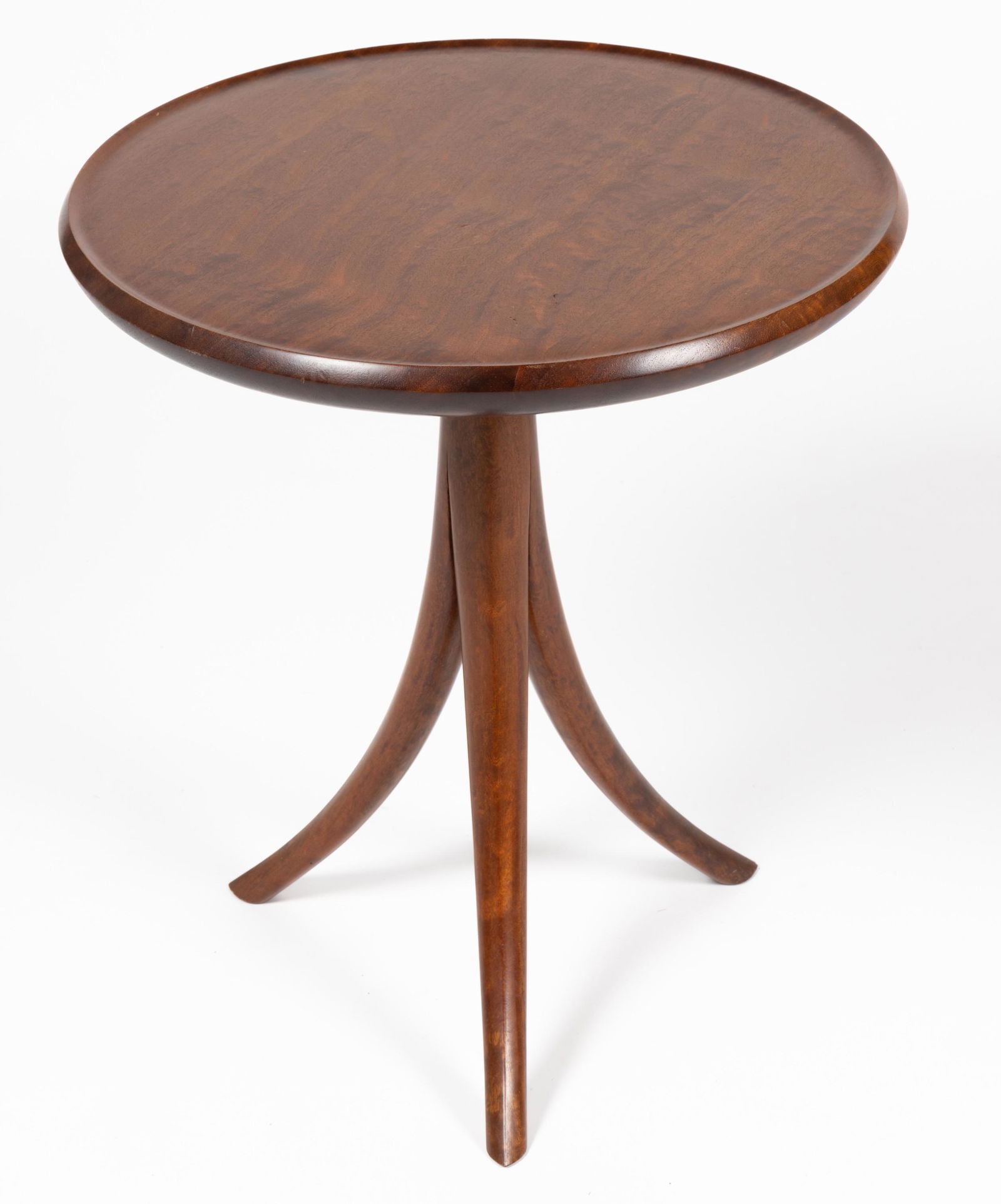 DAVID N. EBNER (AMERICAN, B. 1945) STUDIO CRAFT TRIPOD WINE TABLE: DAVID N. EBNER (AMERICAN, B. 1945) STUDIO CRAFT TRIPOD WINE TABLE, with exceptional figuring, likely a tropical hardwood, featuring circular dished top raised on a stylized one-piece tripod base, mono