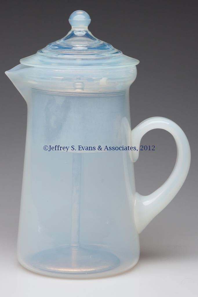 FRY KITCHENWARE COFFEE PERCOLATOR: FRY KITCHENWARE COFFEE PERCOLATOR, Foval pot with opalescent pressed cover and metal insert. H. C. Fry Glass Co. First half 20th century. 9 1/2" HOA. Provenance: Collection of Jack & Dorothy Jordan.