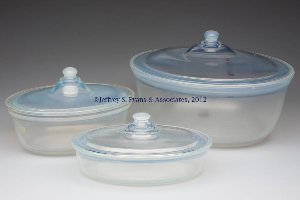 FRY KITCHENWARE OVAL COVERED BAKERS, LOT OF THREE: FRY KITCHENWARE OVAL COVERED BAKERS, LOT OF THREE, opalescent, #1932-12, #1932-9 and #1951-9. H. C. Fry Glass Co. First half 20th century. 12" and 9" L. Provenance: Collection of Jack & Dorothy Jordan