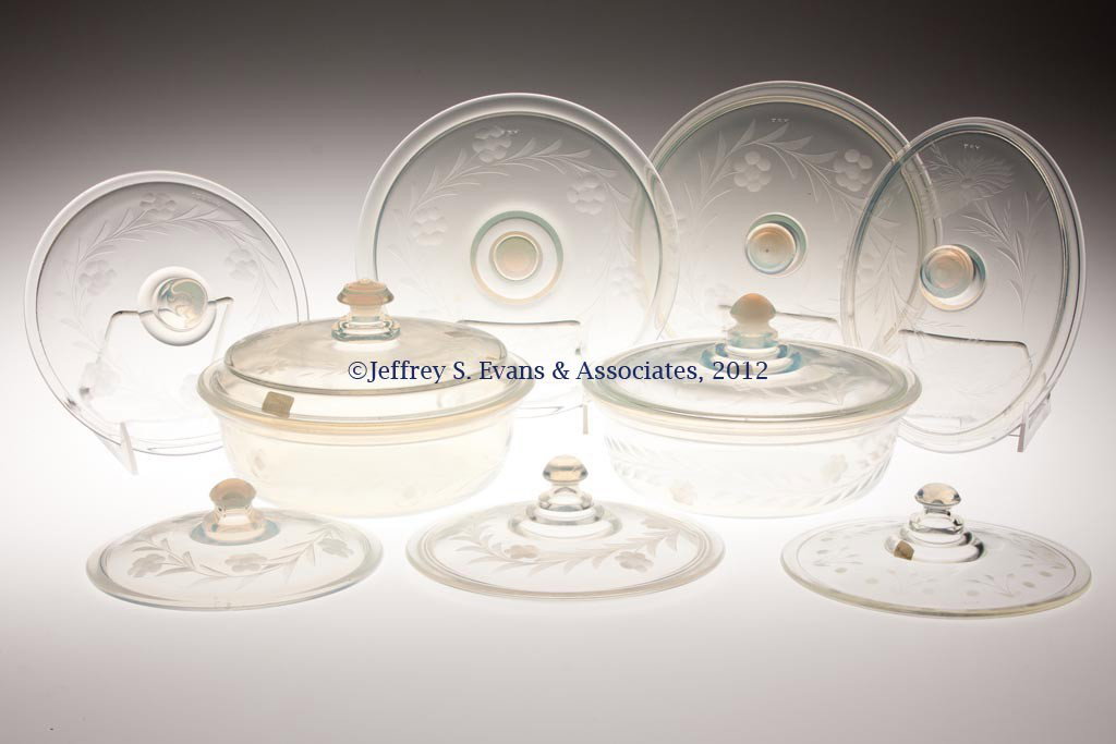 FRY KITCHENWARE ARTICLES, LOT OF NINE: FRY KITCHENWARE ARTICLES, LOT OF NINE, opalescent, each with wheel-cut decoration, comprising two #1938-8 covered dishes and seven various covers. H. C. Fry Glass Co. First half 20th century. Provenan
