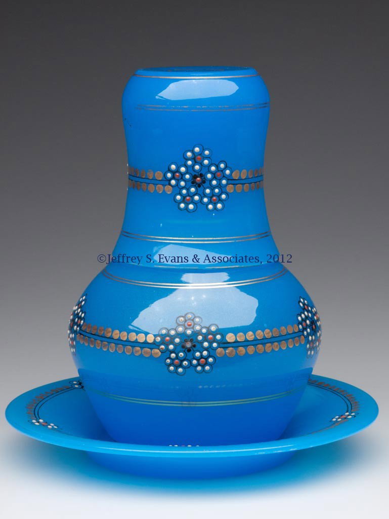EUROPEAN DECORATED OPALINE TUMBLE-UP WITH UNDERTRA: EUROPEAN DECORATED OPALINE TUMBLE-UP WITH UNDERTRAY, translucent blue, gilt and enamel decorations. Fourth quarter 19th century. 7 1/2" H. Provenance: Collection of Jack & Dorothy Jordan.