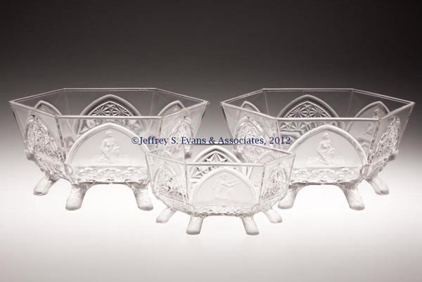 CLASSIC TABLE ARTICLES, LOT OF THREE: CLASSIC TABLE ARTICLES, LOT OF THREE, colorless and frosted, comprising two master berry bowls, and a butter dish base, each on log feet. Gillinder & Sons. Fourth quarter 19th century. 4 5/8" H, 9 1/2