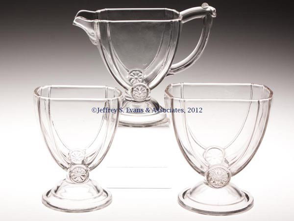 JUMBO - CANTON TABLE ARTICLES, LOT OF THREE: JUMBO - CANTON TABLE ARTICLES, LOT OF THREE, colorless, without ribs, comprising a creamer, sugar lacking cover, and spooner. Canton Glass Co. Fourth quarter 19th century. 5" to 5 1/2" HOA, 2 1/2" x 3
