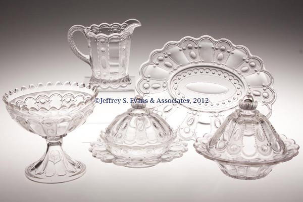 KANSAS / JEWEL AND DEWDROP TABLE ARTICLES, LOT OF : KANSAS / JEWEL AND DEWDROP TABLE ARTICLES, LOT OF SIX, colorless, comprising a flat butter dish, a flanged butter dish with attached undertray, true open compote, low foot with wafer construction, cre