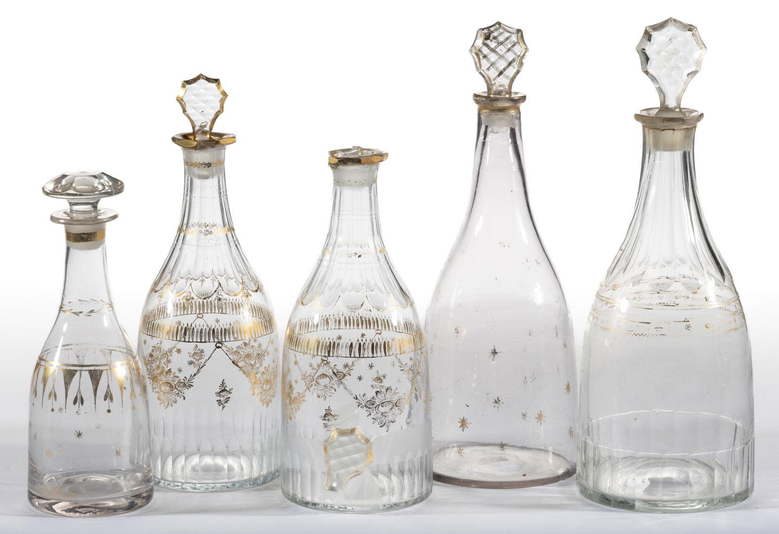 FREE-BLOWN AND ENGRAVED PRUSSIAN-FORM GLASS DECANTERS, LOT OF FIVE (1 of 1)