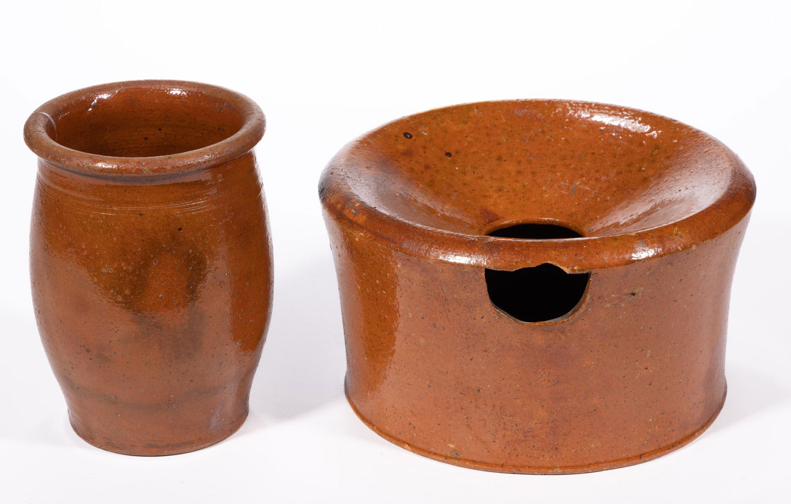 NEW MARKET, SHENANDOAH VALLEY OF VIRGINIA EARTHENWARE / REDWARE ARTICLES, LOT OF TWO: NEW MARKET, SHENANDOAH VALLEY OF VIRGINIA EARTHENWARE / REDWARE ARTICLES, LOT OF TWO, double lead-glazed, comprising an approximately one-quart capacity wide-mouth crock with lightly incised rings bel