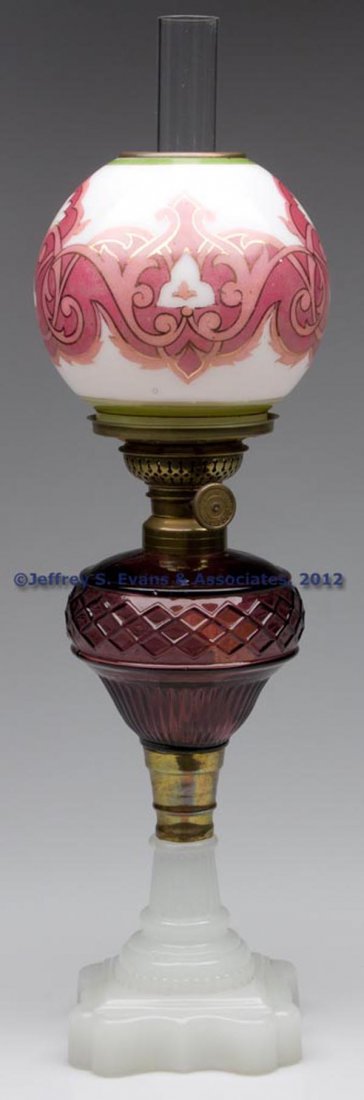 LATTICE BAND AND RIB STAND LAMP: LATTICE BAND AND RIB STAND LAMP, amethyst font, alabaster/clambroth Baroque base, brass connector, No. 1 brass collar. Fitted with a period set-up comprising an E. Miller & Co. central draft burner, t