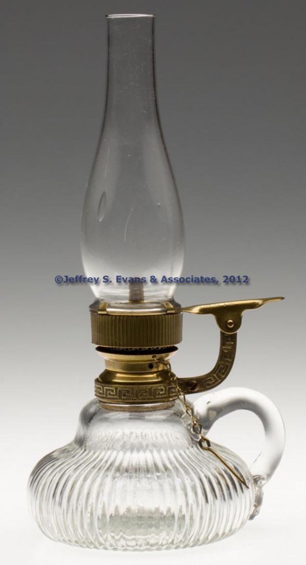 C. W. CAHOON NO. 0 LIP BURNER: C. W. CAHOON NO. 0 LIP BURNER, top of thumb rest marked "CHA'S W. CAHOON / PAT'D FEB. 19th. & DEC 3rd 1861", fitted with a wick pick channel/holder, Greek Key patterned collar ring with attached chain