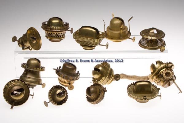 VARIOUS BRASS LIP AND SLIP BURNERS, LOT OF 13: VARIOUS BRASS LIP AND SLIP BURNERS, LOT OF 13, eleven lip burners including a Novelty, a Charles Richmond, Ansonia Brass Co., Manhattan Brass Co. "Elevated" example, Benedict & Burnham "Triumph", Brid