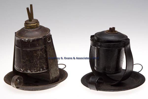 SHEET IRON FLUID BURNING GIMBAL MOUNT LAMPS, LOT O: SHEET IRON FLUID BURNING GIMBAL MOUNT LAMPS, LOT OF TWO, slight tapered forms with weighted fonts, saucer bases with a strap ring handle and a single hanging ring, one example embossed "MASON"S" and w