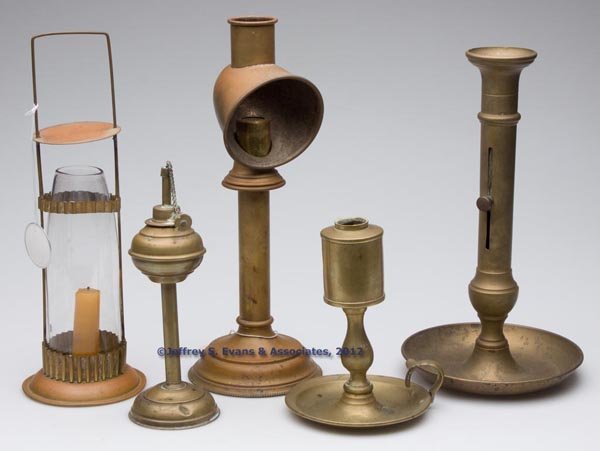 BRASS CANDLE AND FLUID LIGHTING ARTICLES, LOT OF F: BRASS CANDLE AND FLUID LIGHTING ARTICLES, LOT OF FIVE, comprising three candle holders, including a cylinder form with colorless chimney/globe and cover marked "PATD MAY 4.87.", a spring activated exa