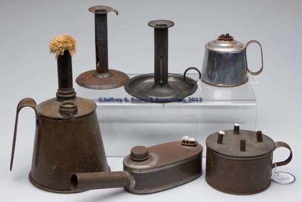 MIXED METALS LIGHTING ARTICLES, LOT OF SIX: MIXED METALS LIGHTING ARTICLES, LOT OF SIX, comprising four oil burning lamps and two push-up candlesticks. Two lamps fitted with brass and tin double-tube burners. 19th and 20th century. 2 1/2" to 8 