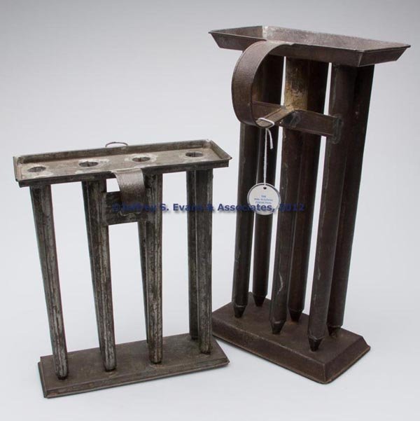 SHEET IRON CANDLE MOLDS, LOT OF TWO: SHEET IRON CANDLE MOLDS, LOT OF TWO, comprising six- and eight-tube rectangular examples, each with widely spaced tubes and strap handle, one with hanging ring, good and excellent surfaces. 19th centu