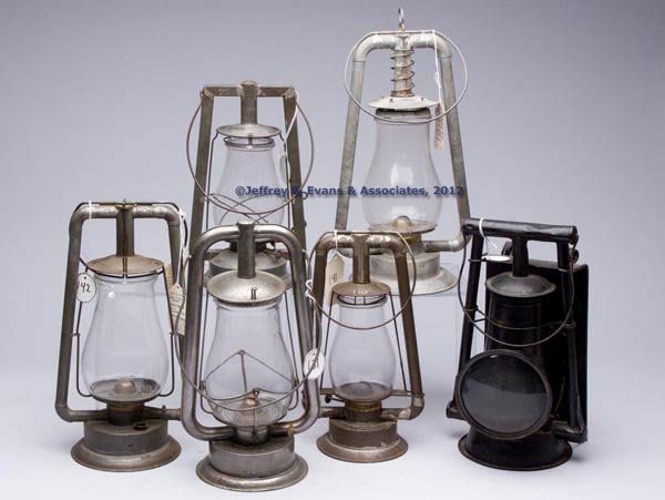 SHEET IRON HOT BLAST TUBULAR LANTERNS, LOT OF SIX: SHEET IRON HOT BLAST TUBULAR LANTERNS, LOT OF SIX, each with bail handle and colorless globe, comprising three Dietz examples including "Little Star", "No. 0 Best", and a "U.S."; a Defiance Lantern &