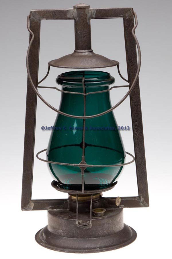 DIETZ "O.K." SHEET IRON HOT BLAST TUBULAR LANTERN: DIETZ "O.K." SHEET IRON HOT BLAST TUBULAR LANTERN, bail handle, top of flat font embossed "DIETZ NO 0 O. K. / NEW YORK U.S.A." and with shoulder refill feature, brilliant teal-green globe. Fitted with