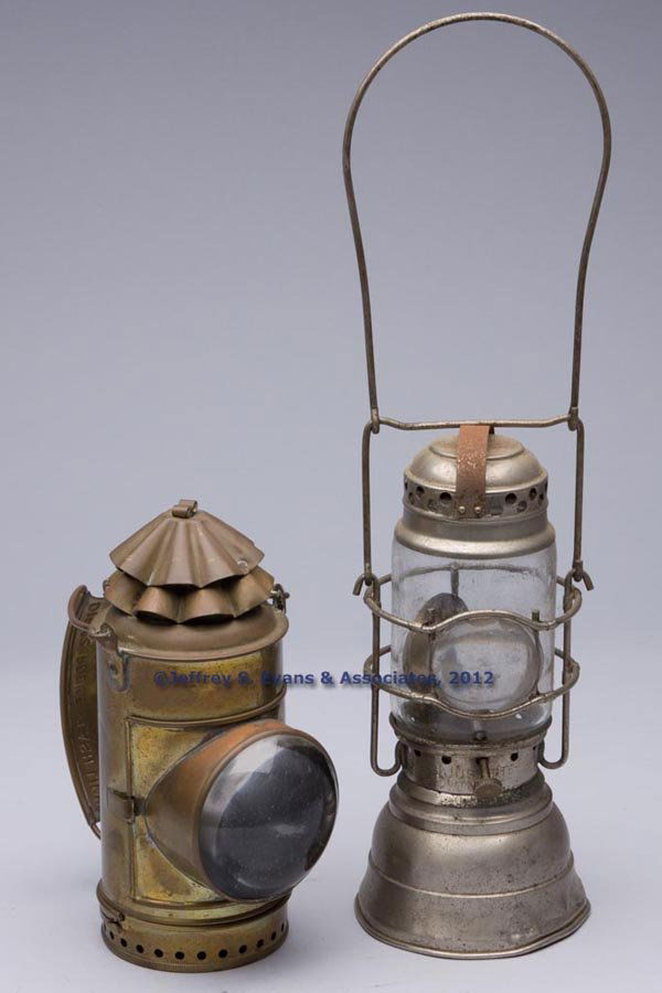 VARIOUS METAL OCCUPATIONAL BULL'S-EYE LANTERNS, LO: VARIOUS METAL OCCUPATIONAL BULL'S-EYE LANTERNS, LOT OF TWO, comprising a brass Dietz police flash light, strap handle marked "DIETZ POLICE FLASH LIGHT / NEW YORK U.S.A.", sliding shutter feature, circ