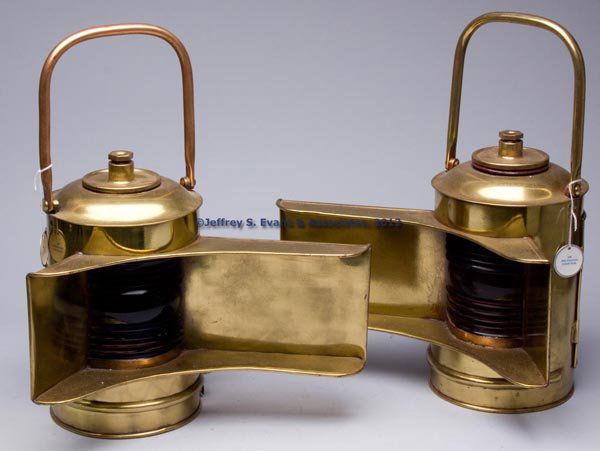 BRASS PORT AND STARBOARD RUNNING ELECTRIC MARINE L: BRASS PORT AND STARBOARD RUNNING ELECTRIC MARINE LIGHTS, LOT OF TWO, polished, one example with a brass and other with a copper heavy bail handle, backs with a hinged door and each interior fitted wit