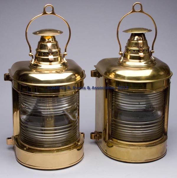 F. H. LOVELL AND CO. BRASS MASTHEAD MARINE LANTERN: F. H. LOVELL AND CO. BRASS MASTHEAD MARINE LANTERNS, PAIR, polished, bail handle and hinged cover, flat back and sides with four mounting lugs, cover impressed "LOVELL ARLINGTON, N. J.", colorless fre