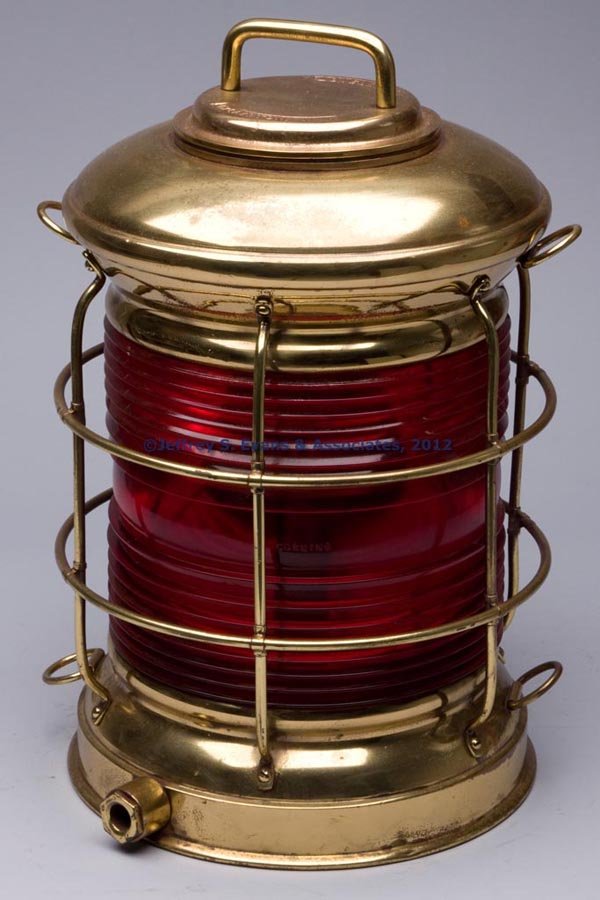 F. H. LOVELL AND CO. BRASS AND BRONZE BREAKDOWN EL: F. H. LOVELL AND CO. BRASS AND BRONZE BREAKDOWN ELECTRIC MARINE LIGHT, lightly polished, removable cast bronze flat top with handle, top marked "LOVELL ARLINGTON, N. J.", four securing hooks, 360 degr