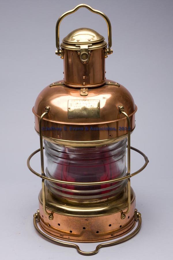 NIPPON SENTO CO. "NOT UNDER COMMAND LIGHT" BRASS A: NIPPON SENTO CO. "NOT UNDER COMMAND LIGHT" BRASS AND COPPER MARINE LANTERN, polished, hinged cover with handle, maker's plate marked with Japanese figures and "147 / NOT UNDER COMMAND LIGHT / 1 / A652