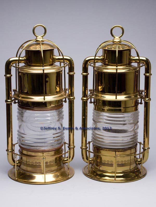 BRASS COLD BLAST TUBULAR SIGNAL MARINE LANTERNS, P: BRASS COLD BLAST TUBULAR SIGNAL MARINE LANTERNS, PAIR, polished, ring handle, thread screws for elevation of band which secures top of globe and allows for removal, wire guard to top and bottom, under
