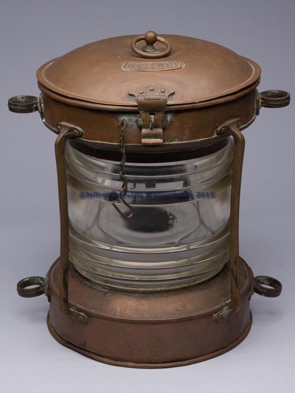 ENGLISH "ANCHOR" COPPER ELECTRIC MARINE LIGHT: ENGLISH "ANCHOR" COPPER ELECTRIC MARINE LIGHT, hinged cover with ring handle and maker's plate marked "ANCHOR", worn impressing "PICHARD PICKERS? / MAKERS / STOCKTON-ON-TEES", sides with four mounting