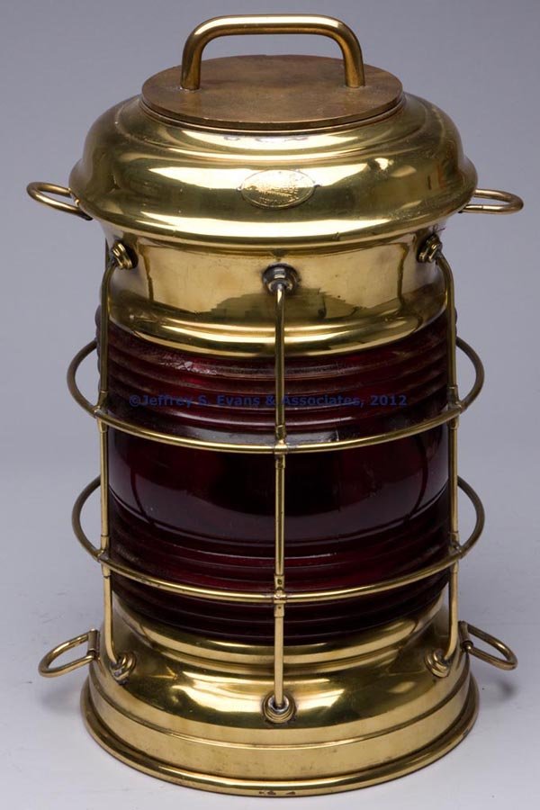 PERKINS "PERKO" BRASS AND BRONZE ELECTRIC BREAKDOW: PERKINS "PERKO" BRASS AND BRONZE ELECTRIC BREAKDOWN MARINE LIGHT, polished, removable cast bronze cover with handle, interior marked "PERKO", maker's oval plate marked "PERKINS MARINE LAMP & HDW CORP 