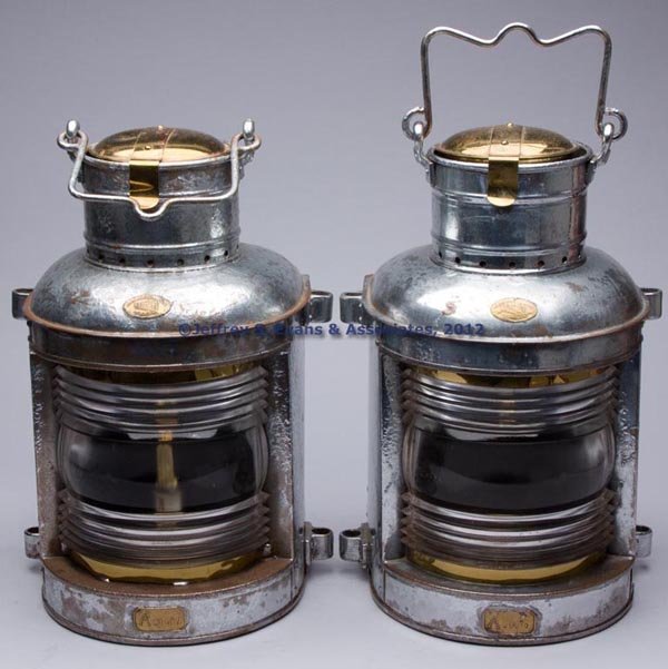 PERKINS "PERKO" GALVANIZED SHEET IRON AND BRASS MA: PERKINS "PERKO" GALVANIZED SHEET IRON AND BRASS MASTHEAD / STERN MARINE LANTERNS, PAIR, repainted silver, bail handle and hinged cap, brass maker's plate marked "PERKINS MARINE LAMP & HDWE CORP. / PER