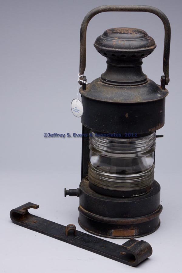 ARTISTIC BRASS & BRONZE WORKS SHEET IRON SIDE MARI: ARTISTIC BRASS & BRONZE WORKS SHEET IRON SIDE MARINE LANTERN, painted black, bail handle, base with a copper maker's plate marked "MARINE - DIVISION / ARTISTIC BRASS & BRONZE WKS / NEW - YORK, N. Y.",