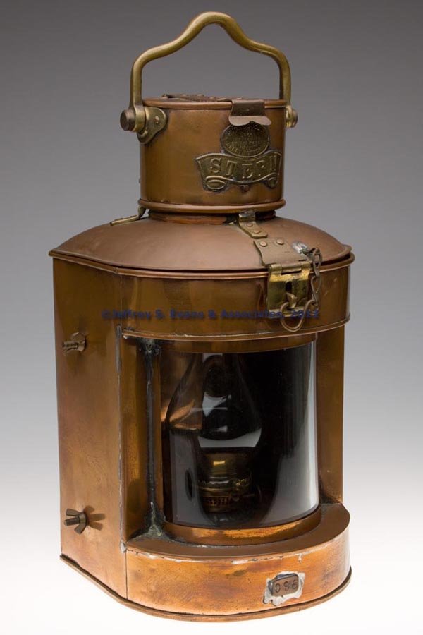 HUGH DOUGLAS "STERN" BRASS AND COPPER MARINE LANTE: HUGH DOUGLAS "STERN" BRASS AND COPPER MARINE LANTERN, flat back with mounting bracket, hinged cap with handle and brass maker's plate marked "HUGH DOUGLAS SHEET IRON WORKER / WALNSLEY ST / L'POOL / SH