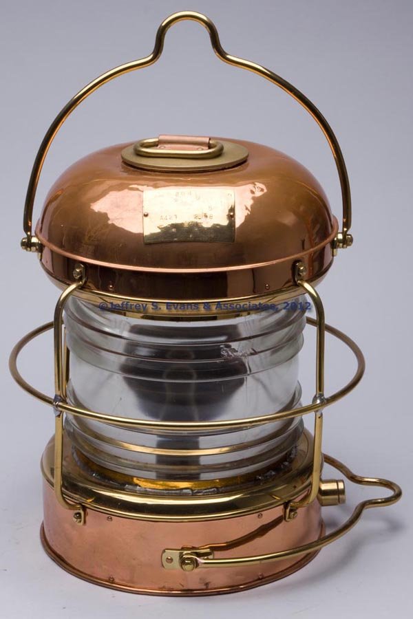 NIPPON SENTO CO. BRASS AND COPPER ELECTRIC MARINE: NIPPON SENTO CO. BRASS AND COPPER ELECTRIC MARINE LIGHT, polished, bail handle and removable cover with handle, maker's plate marked with various Japanese figures and "264 / WHITE LIGHT / 5 / A421 / 2