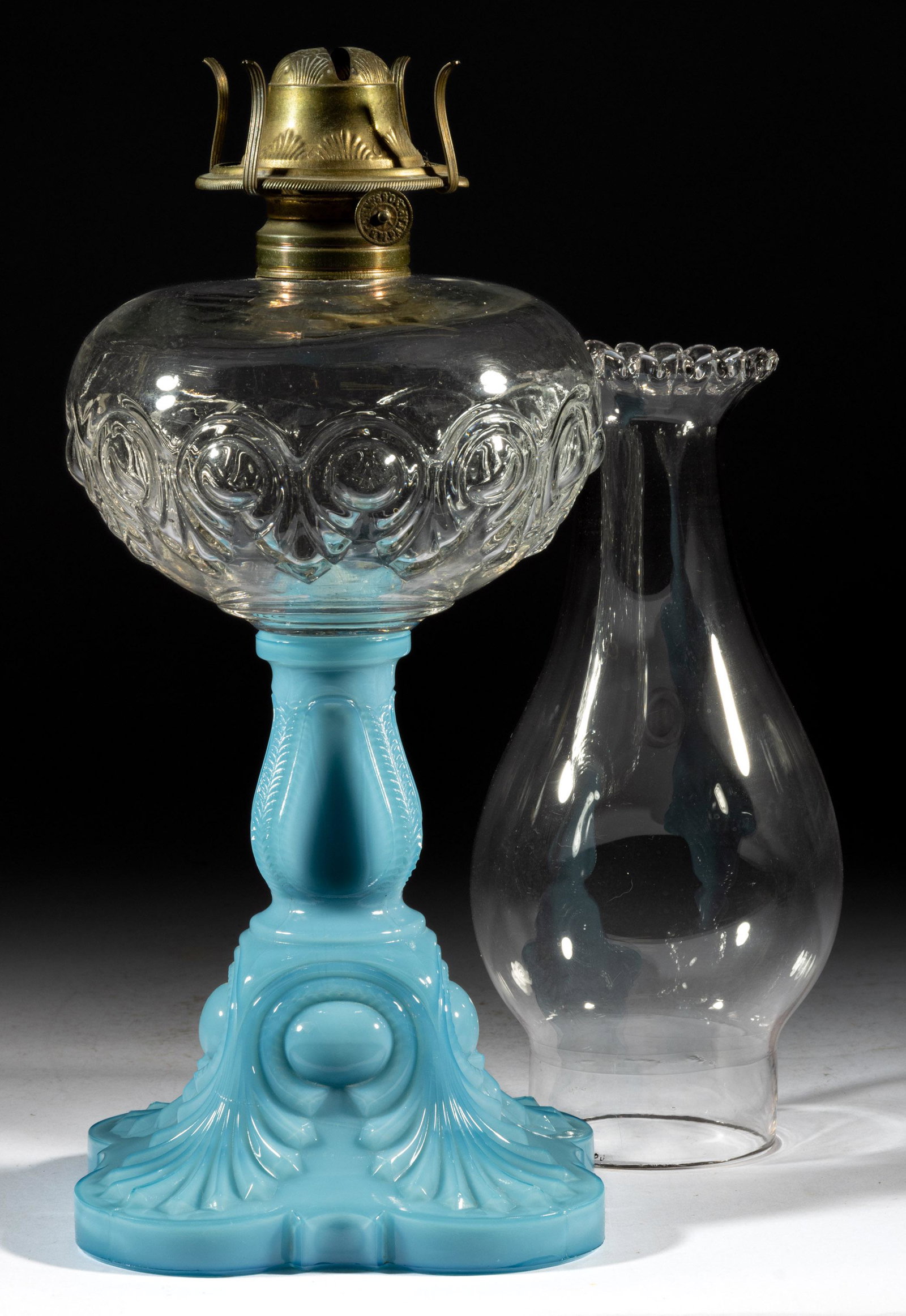 BULLSEYE FINE DETAIL KEROSENE STAND LAMP: BULLSEYE FINE DETAIL KEROSENE STAND LAMP, colorless font, opaque pale blue base with a hint of opalescence to the top of stem, No. 2 Taplin-Brown collar. Fitted with a period setup comprising a No. 2 