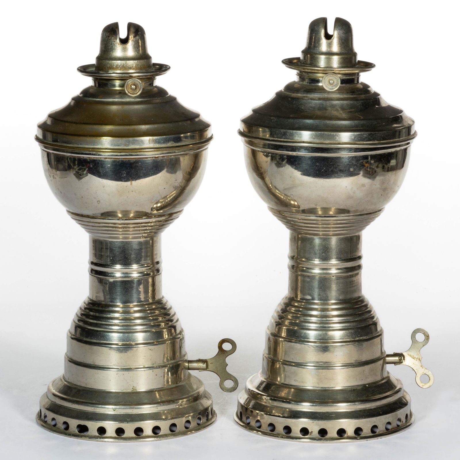 NICKEL-PLATED BRASS MAY'S NEW IDEAL MECHANICAL KEROSENE STAND LAMPS, PAIR (1 of 1)