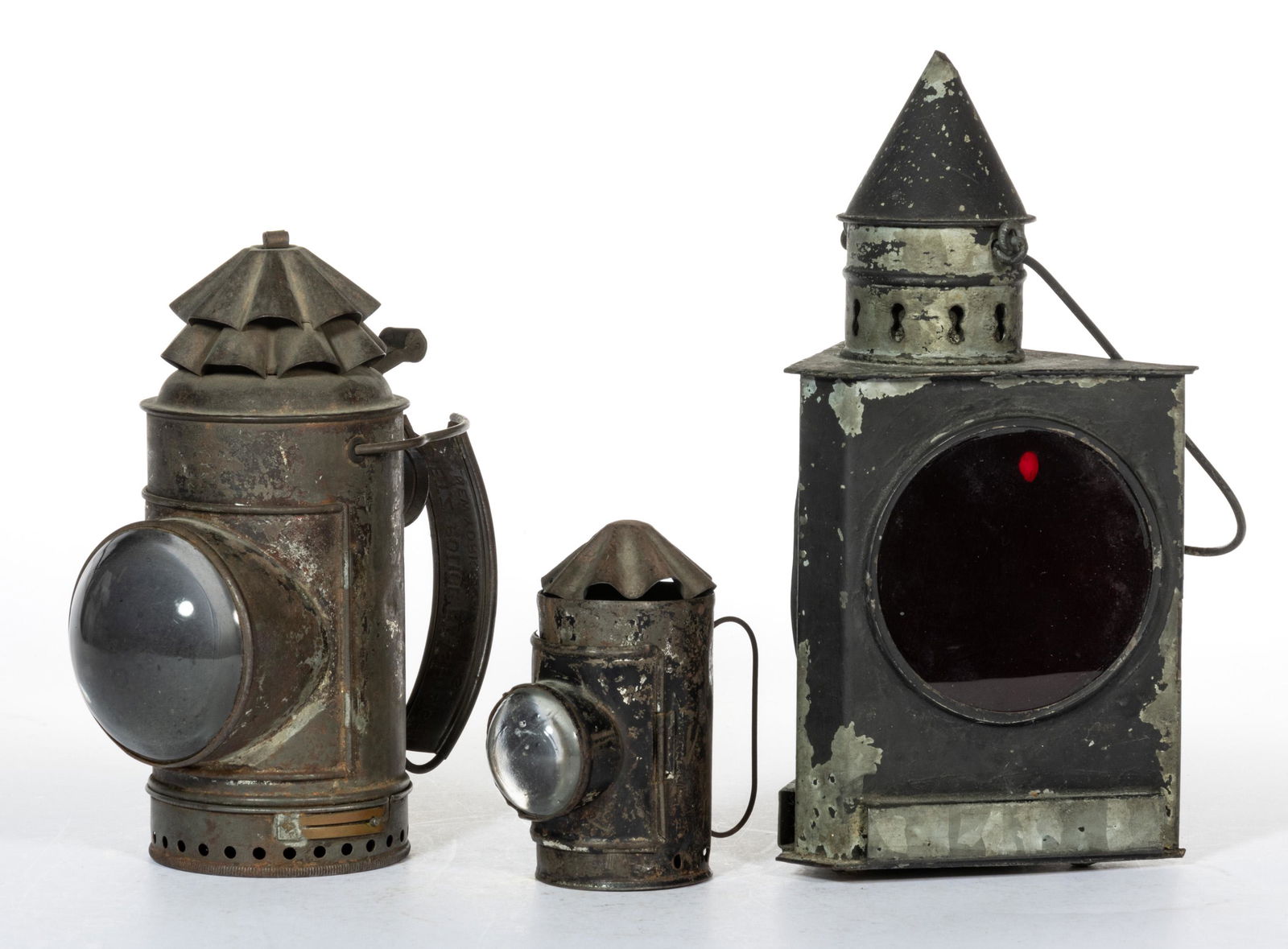 ASSORTED SHEET-IRON LANTERNS, LOT OF THREE: ASSORTED SHEET-IRON LANTERNS, LOT OF THREE, comprising two Bullseye examples, including a Dietz Police Flash Light with remnants of Japanned finish, wire and strap handle with maker's name em