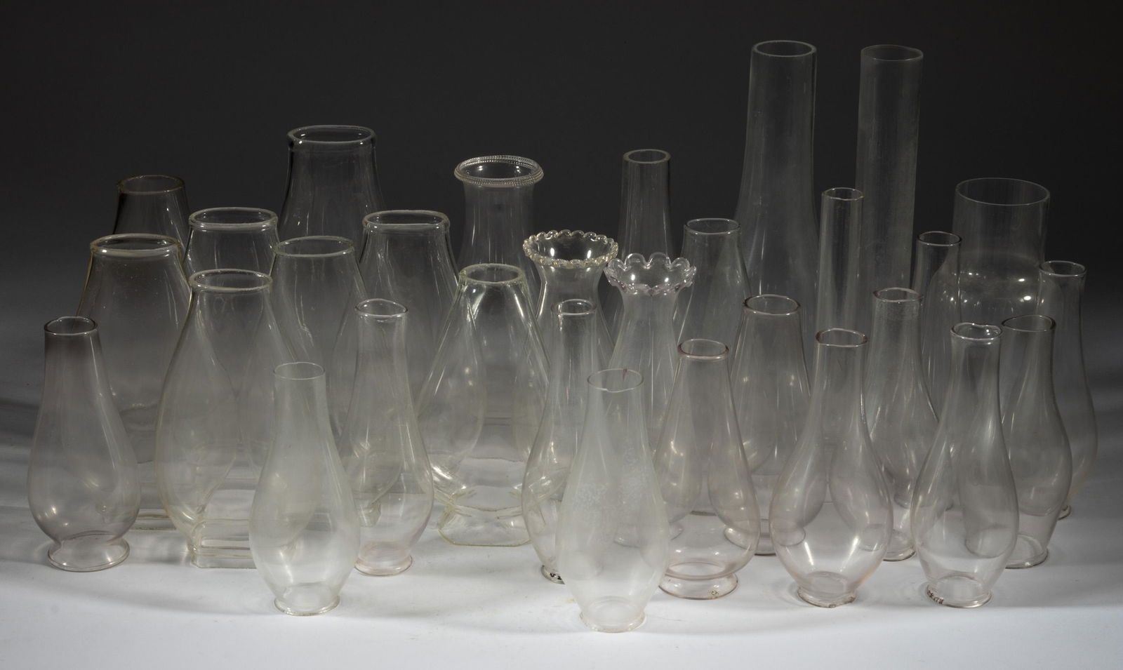 ASSORTED GLASS LIP AND SLIP CHIMNEYS, LOT OF 29 (1 of 1)