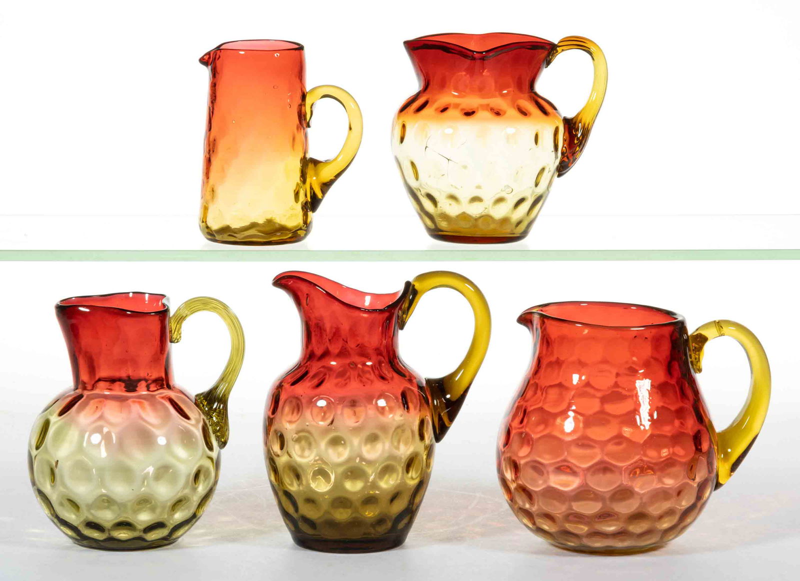 AMBERINA CREAM PITCHERS, LOT OF FIVE (1 of 1)