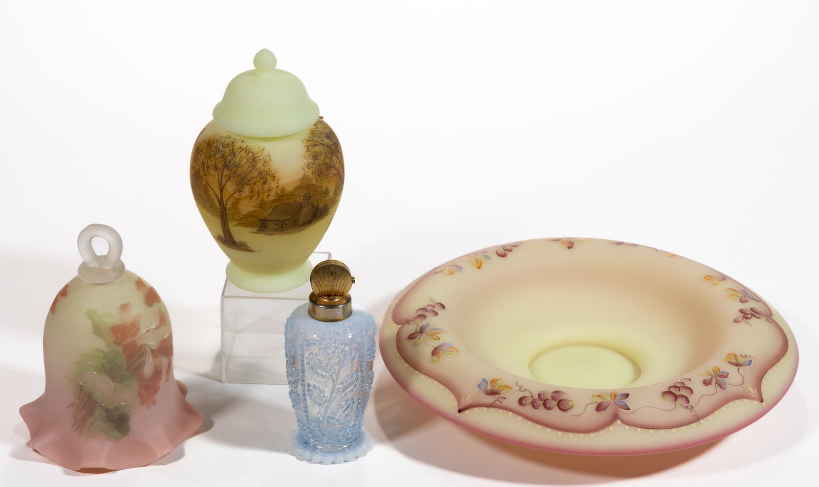 FENTON DECORATED AND OPALESCENT ARTICLES, LOT OF THREE: FENTON DECORATED AND OPALESCENT ARTICLES, LOT OF THREE, comprising a light blue opalescent atomizer made for DeVilbis; a satin custard (reacts under black light) covered ginger jar with cabi