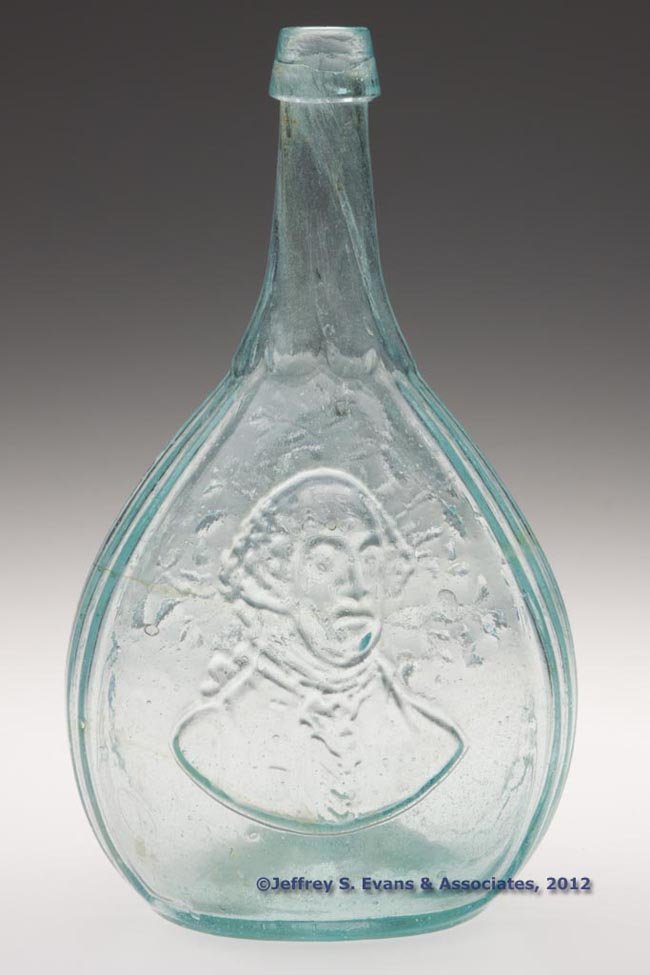 GI-35 WASHINGTON - TREE PORTRAIT CALABASH FLASK: GI-35 WASHINGTON - TREE PORTRAIT CALABASH FLASK, aquamarine with several olive amber streaks, applied sloping mouth, rough pontil mark. United States. 1850-1870. 9" H.