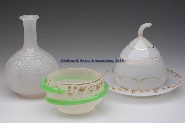 BLOWN AND MOLDED OPALINE-STYLE ARTICLES, LOT OF TH: BLOWN AND MOLDED OPALINE-STYLE ARTICLES, LOT OF THREE, alabaster/clambroth, comprising a covered puff box with underplate, a box with applied green snake, lacking cover, and a water bottle with diamon